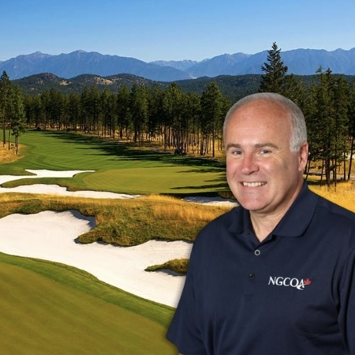 A man wearing a shirt that says ngcqa stands in front of a golf course
