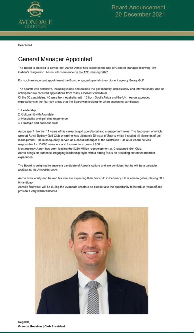 a man in a suit and tie is smiling for the camera .